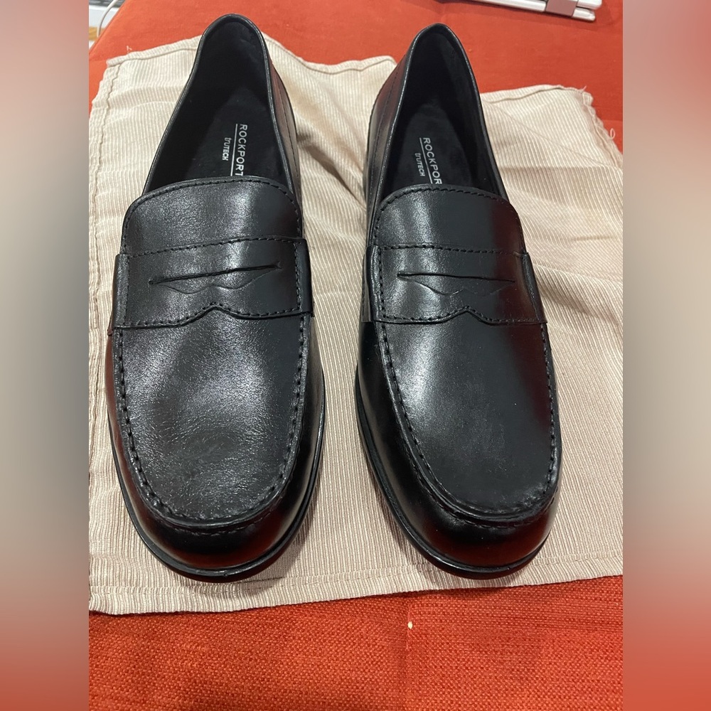 Brand New Rockport Black shoes for men.
